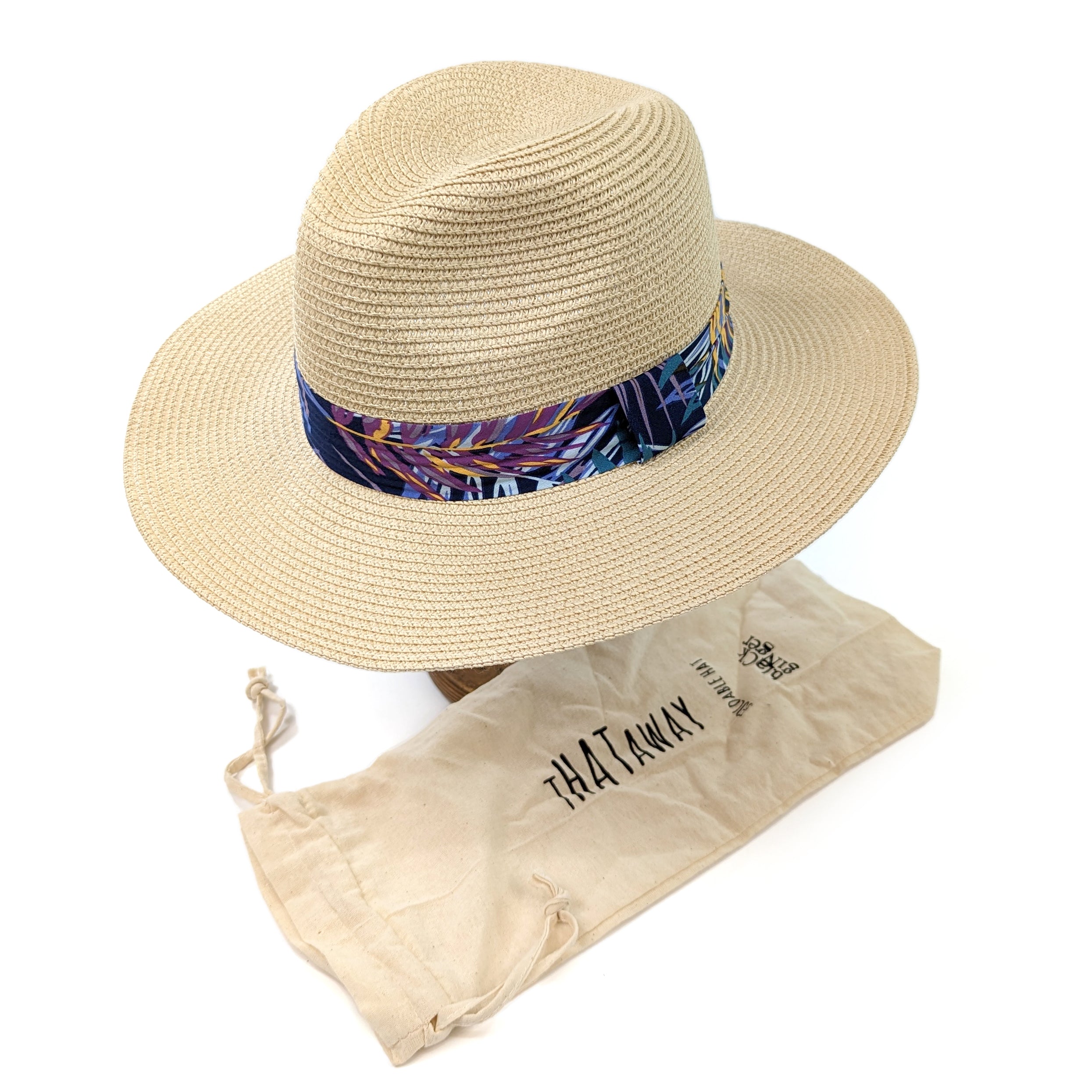 A traditional panama style hat made from 100% paper. tropical ribbon band. it is the perfect travel hack as it comes with a  pouch. Great UPF 50 sun protection