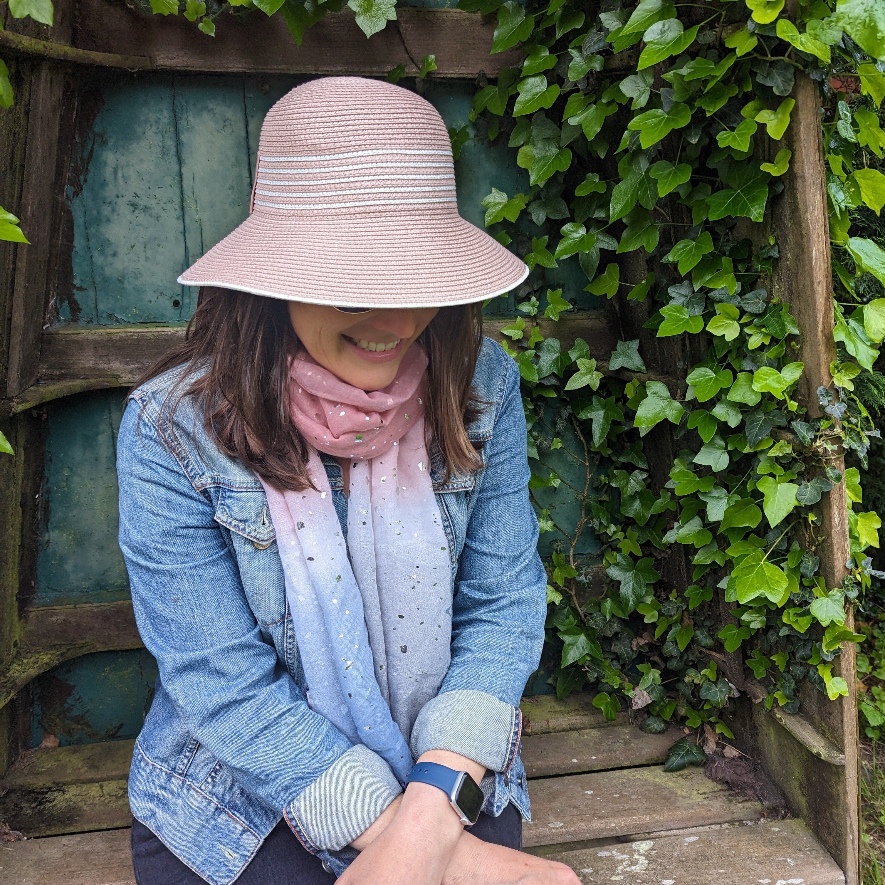 PInk Cloche hat.  Perfect sun protection.  Also great travel hack as it rolls up into a travel bag